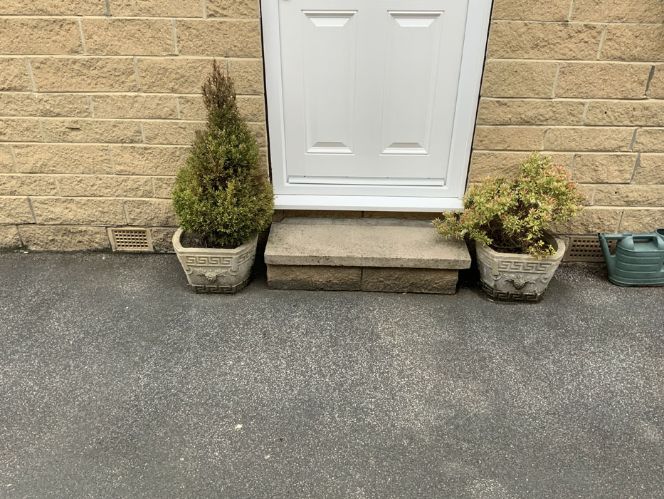Before image of a driveway and step in WF15